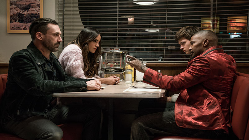 Four actors from 'Baby Driver' sitting at a table together