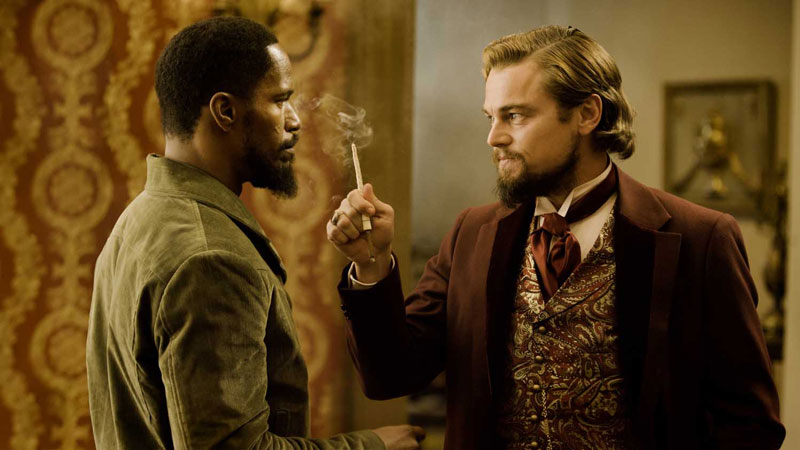 Jamie Foxx and Leonardo DiCaprio from 'Django Unchained' looking each other in the eye