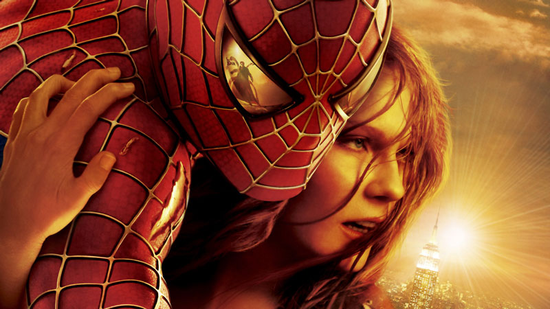 Mary Jane holding onto Spider-Man as Doctor Octopus is mirrored in Spider-Man's eye in 'Spider-Man 2'