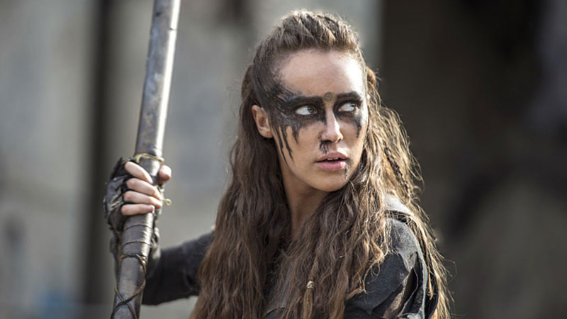 An actress from 'The 100' on The CW with a tribal look and war paint