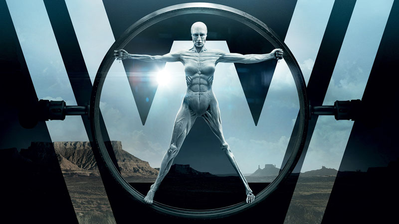 The Host from 'Westworld' on HBO, with limbs outstretched bound by a circle in front of a large 'W'